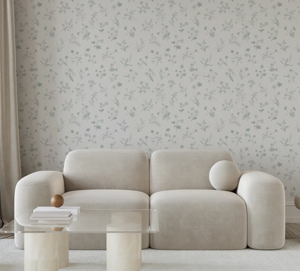 sofa with botanical wall paper
